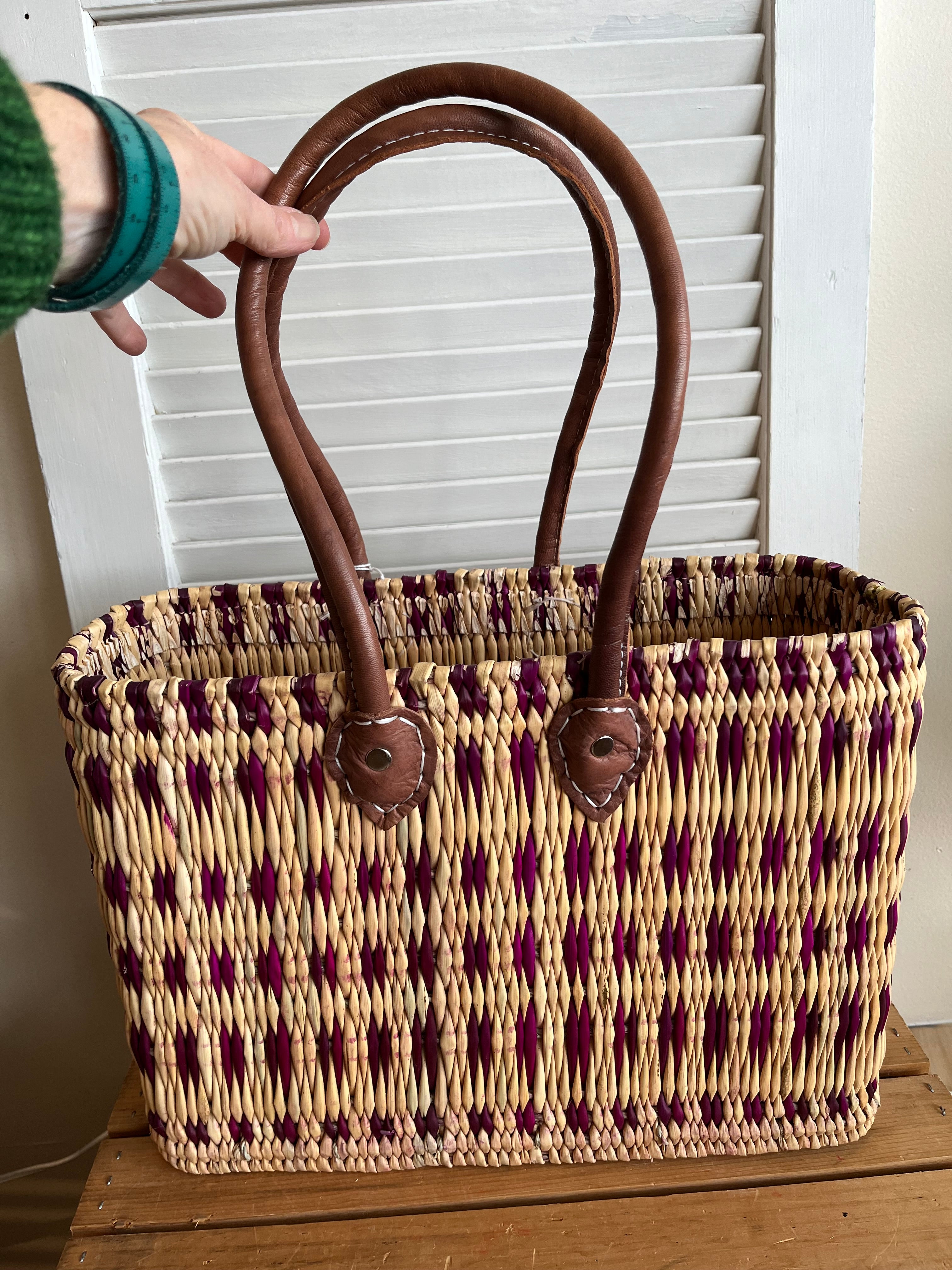 Moroccan tote-style basket with long handles