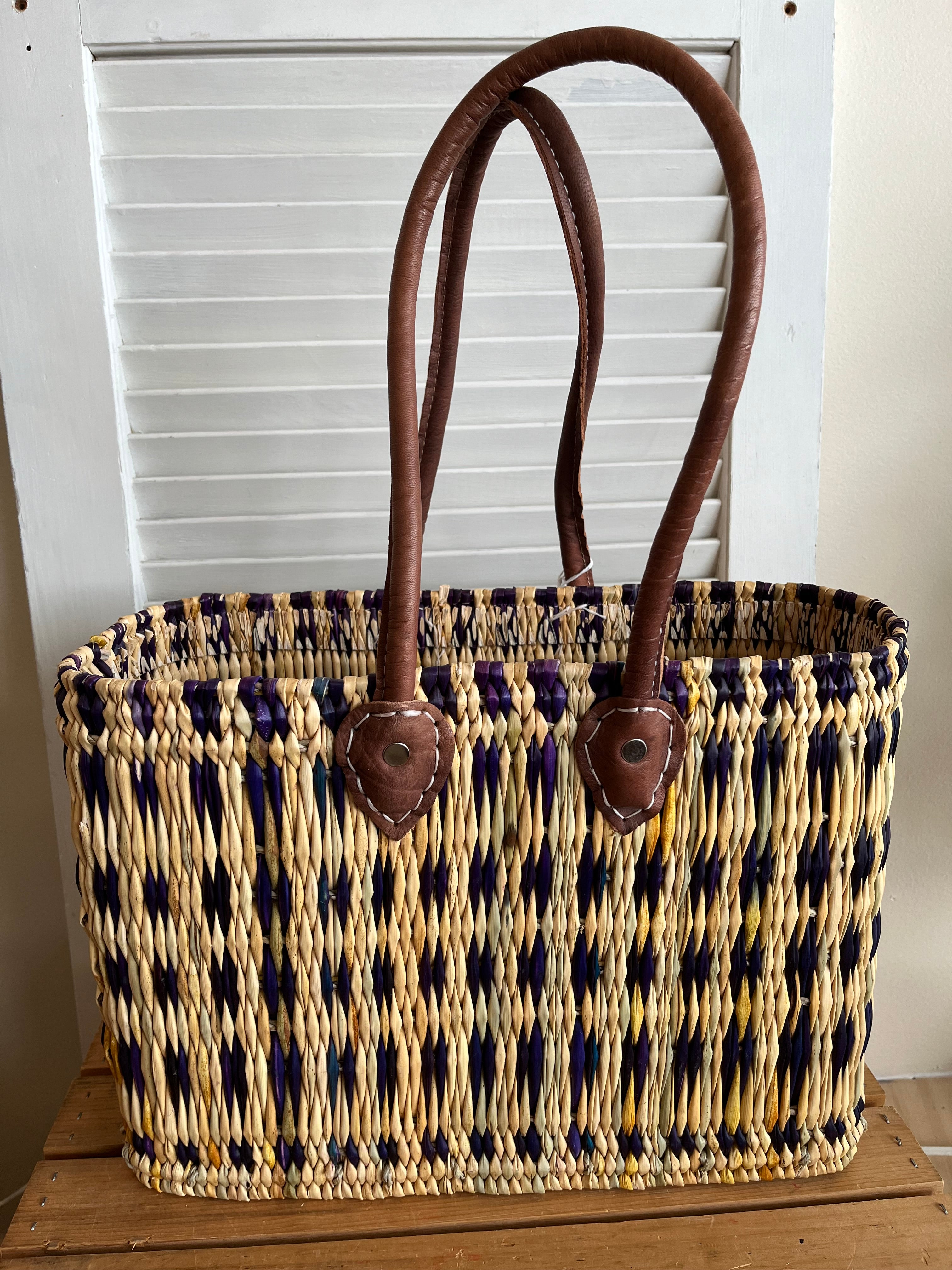 Moroccan tote-style basket with long handles