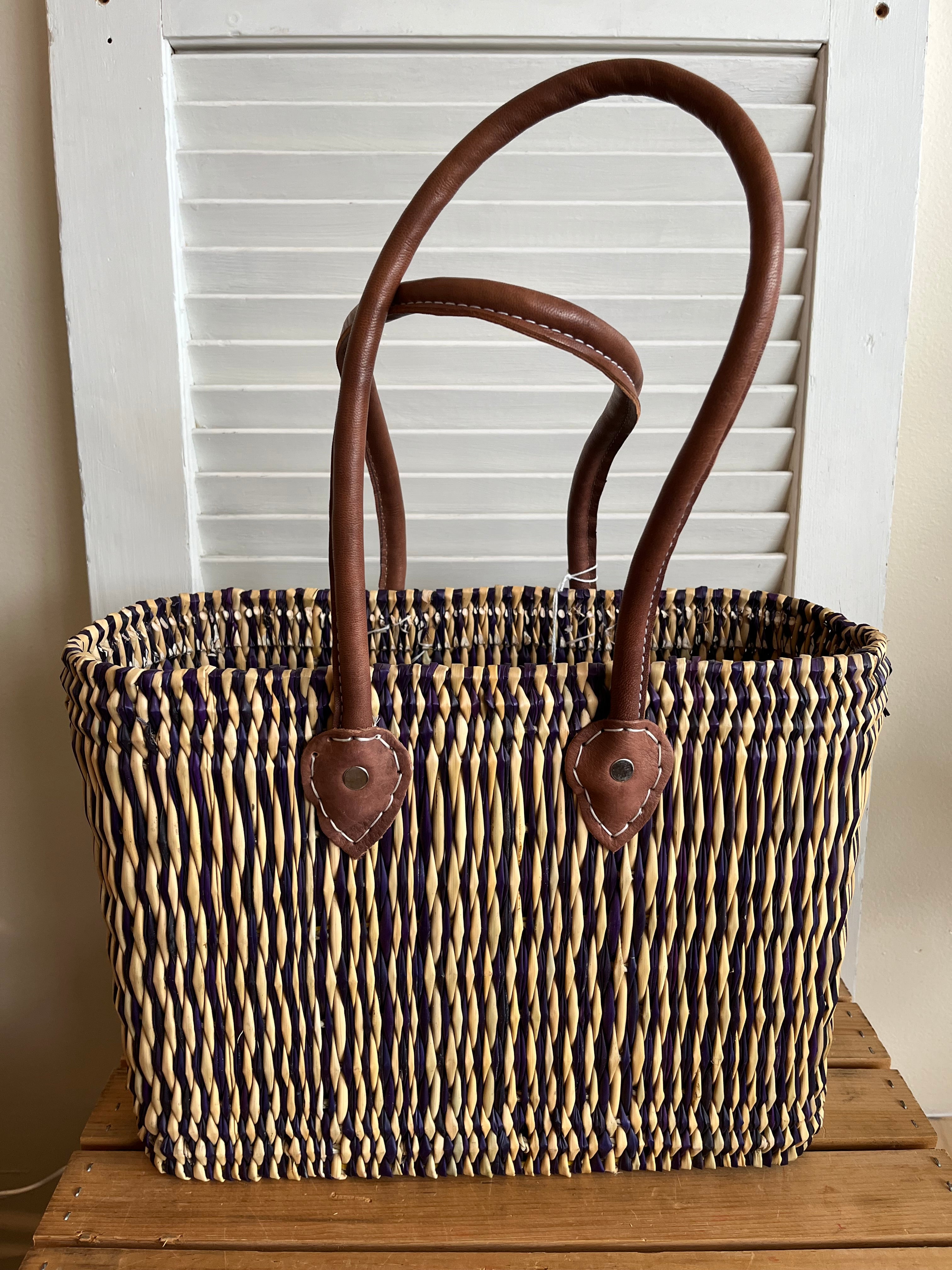 Moroccan tote-style basket with long handles